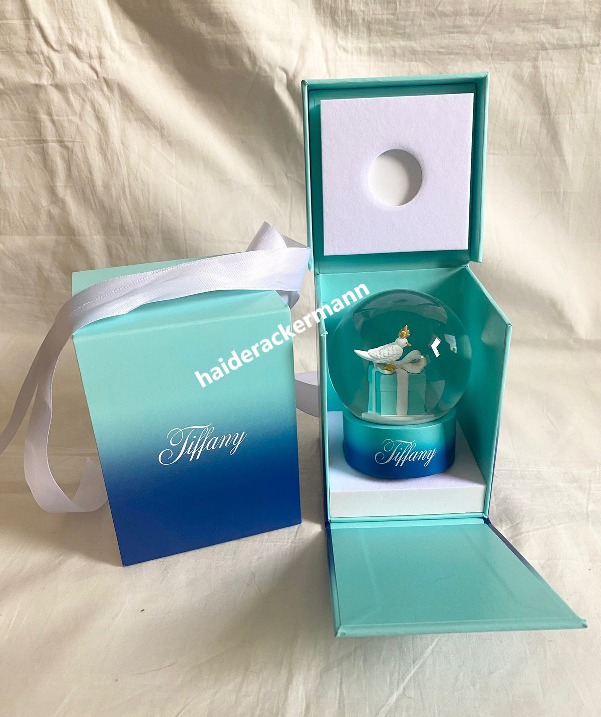 Tiffany & Co 2024 Christmas bird on a rock snow globe