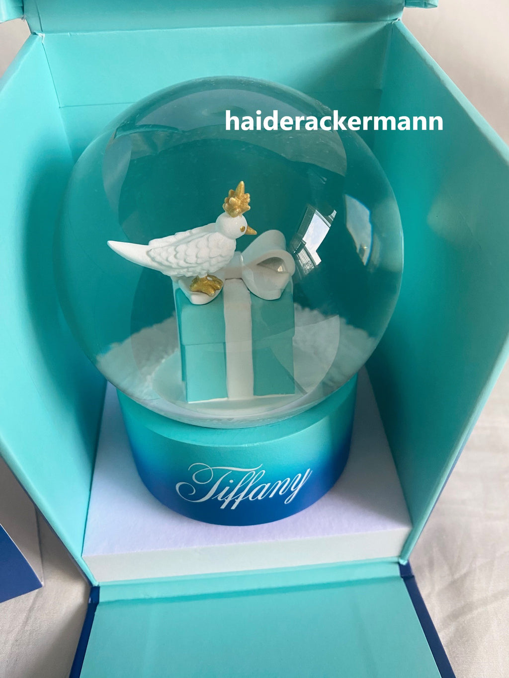 Tiffany & Co 2024 Christmas bird on a rock snow globe