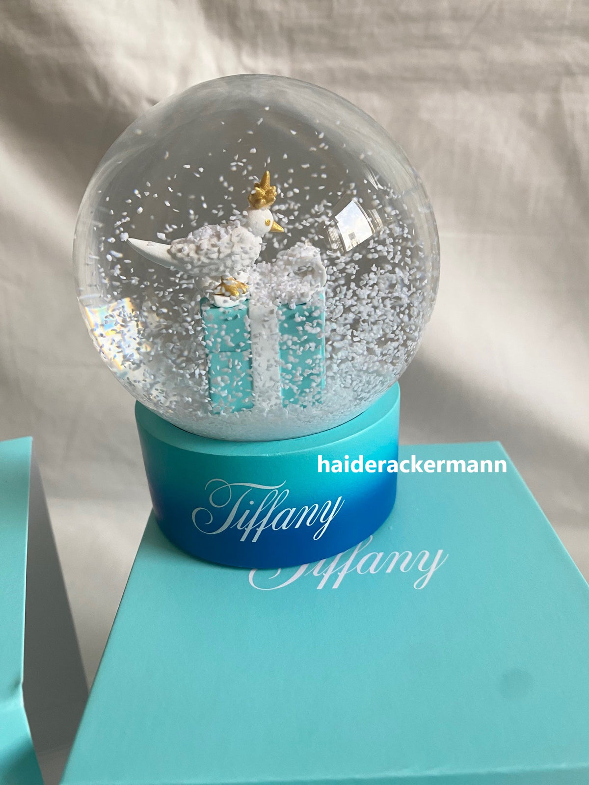Tiffany & Co 2024 Christmas bird on a rock snow globe